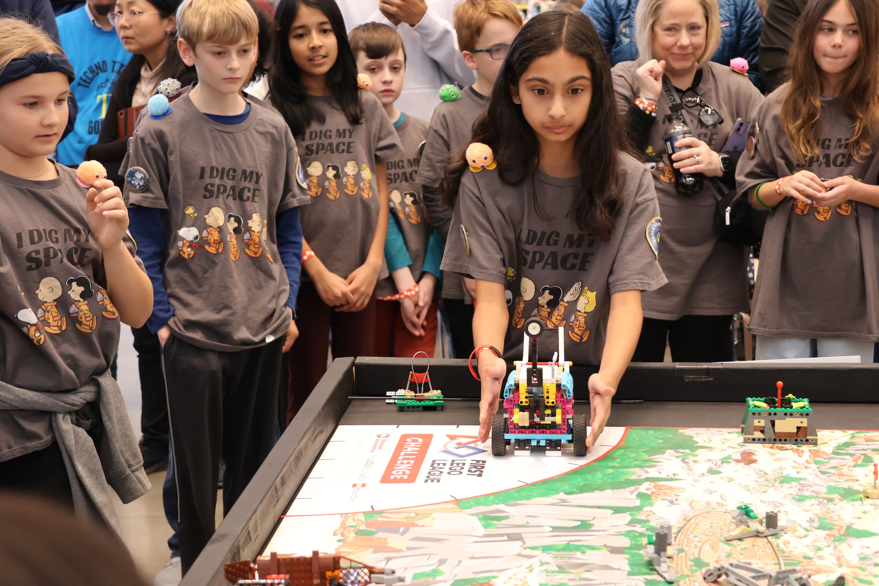 Students participating in FIRST Lego League Challenge tournament
