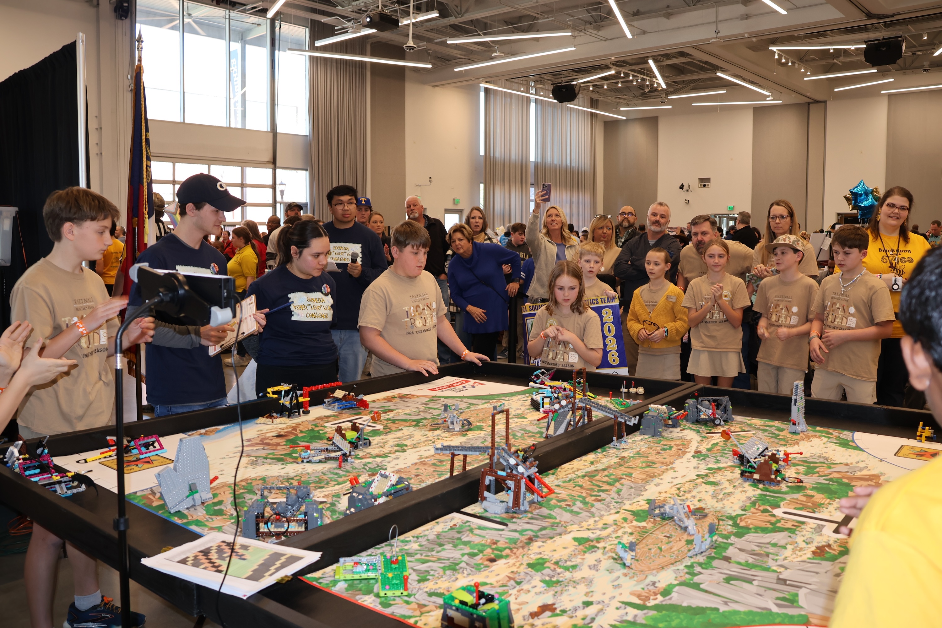 Students participating in FIRST Lego League Challenge tournament